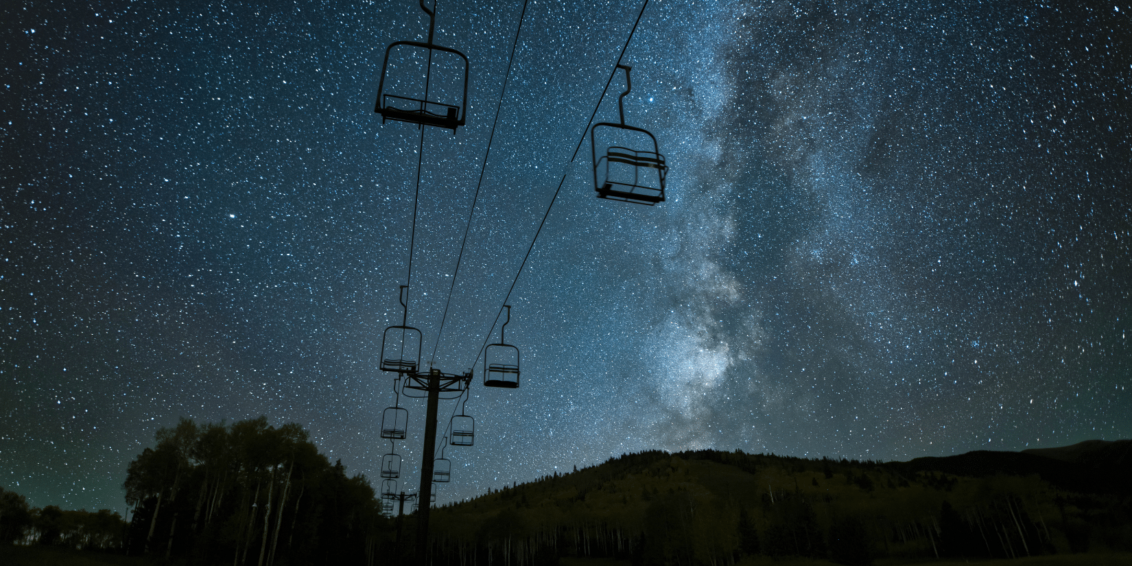 ski lift above milky way galaxy